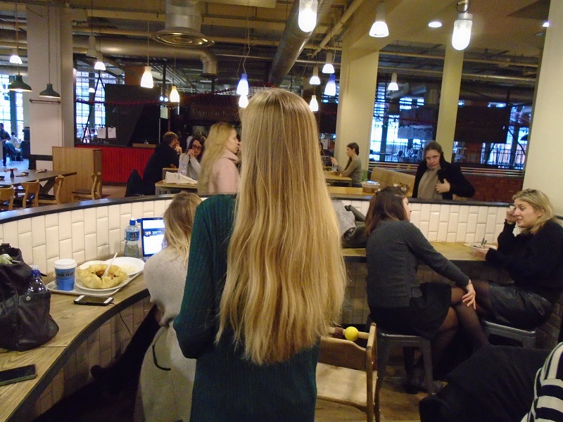 Emma shows how longs how long her hair has grown over the many years that she has not cut it
