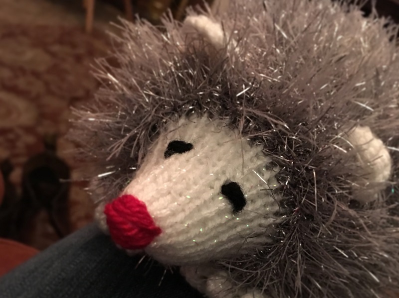knitted hedgehogs using wool containing tinsel are sold by Porridge and Rice to raise money for schools in Kenya